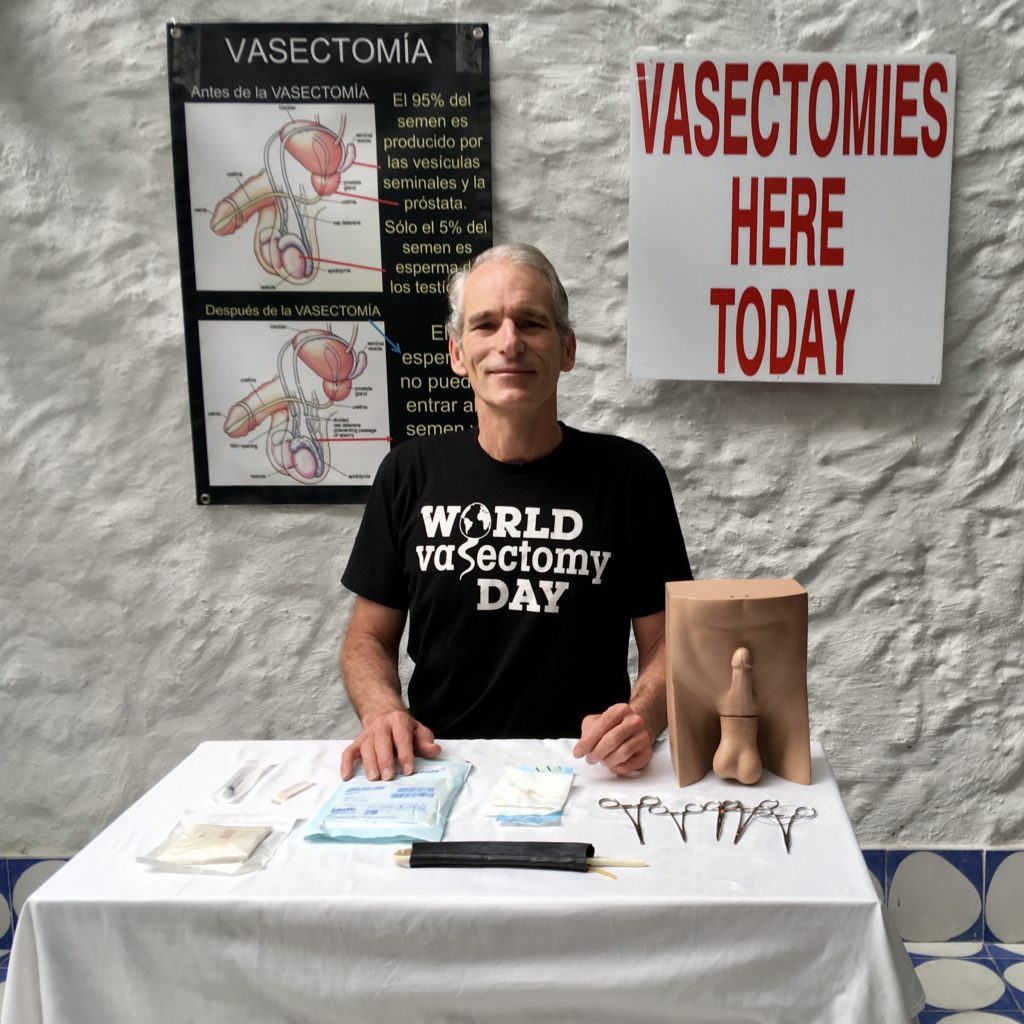 Dr John Curington giving vasectomy webinar talk in Colombia