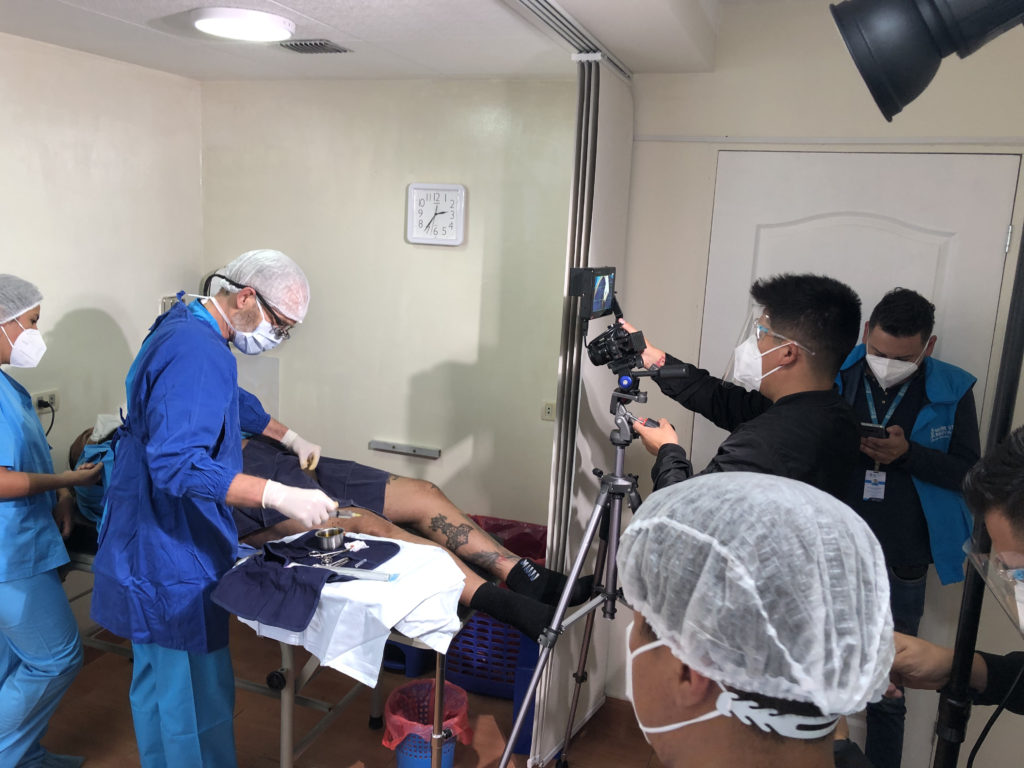 Dr John Curington performing no-scalpel vasectomy while being filmed - MSI Clinic - La Paz, Bolivia
